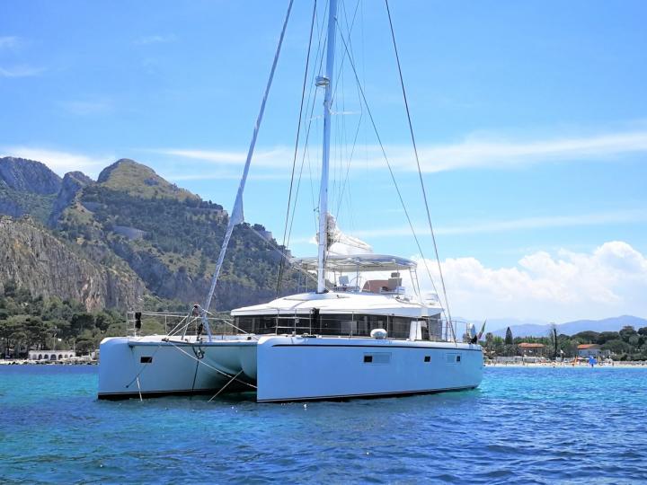 Discover boating aboard the 52ft Denilos boat in Cannigione, Italy - a 6 cabins catamaran for rent.