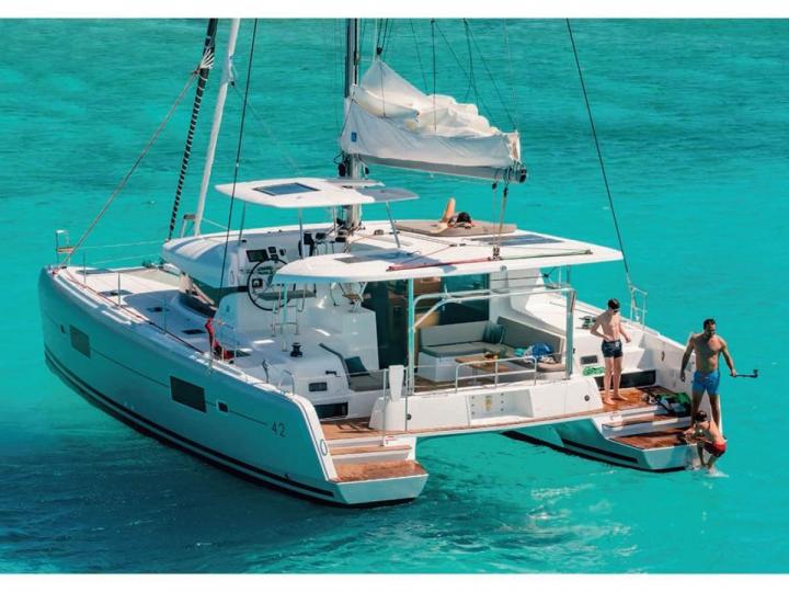 Catamaran boat for rent in Portisco, Italy, for up to 8 guests.