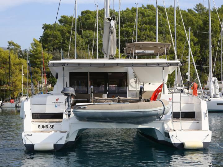 Private catamaran boat for rent in Göcek, Turkey.